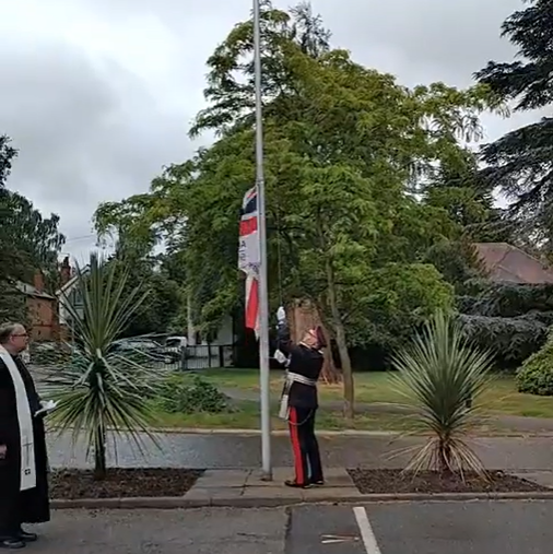 Lord-Lieutenant of Leicestershire, Mr Michael Kapur OBE raising the Armed Forces Day flag