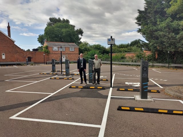OWBC Climate Change Officer Christopher Harrison and Councillor David Carter at Countesthorpe Road car park with the new EV chargers