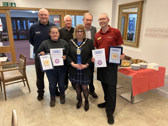 Mayor of Oadby & Wigston with representatives from Epic Accessories and Zeph's Cafe after presenting them with their Plastic Free Oadby certificates and plaques
