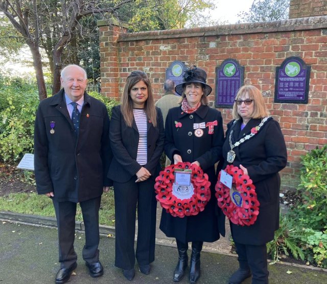 Photo of four people including leader of the council councillor Samia Haq and Mayor Councillor Rosemarie Adams at the Remembrance Day service in Peace Memorial Park 2023